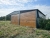 garaz-blaszany-z-wiata-9x6m-matowa-czern-dab-rustykalny-furtka-4.jpg