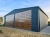 garaz-blaszany-dwuspadowy-7x7m-grafit-dab-furtka-okna-1.jpg